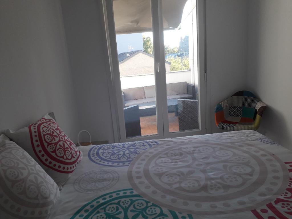 Posteľ alebo postele v izbe v ubytovaní Jaen Apartment