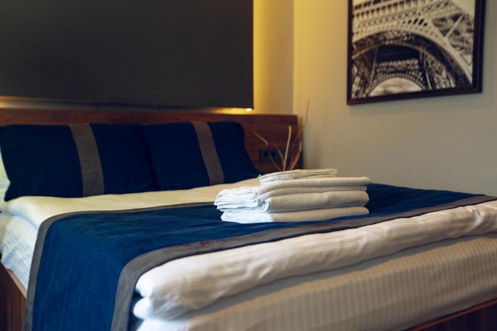 A bed or beds in a room at Grand Catalkaya Hotel