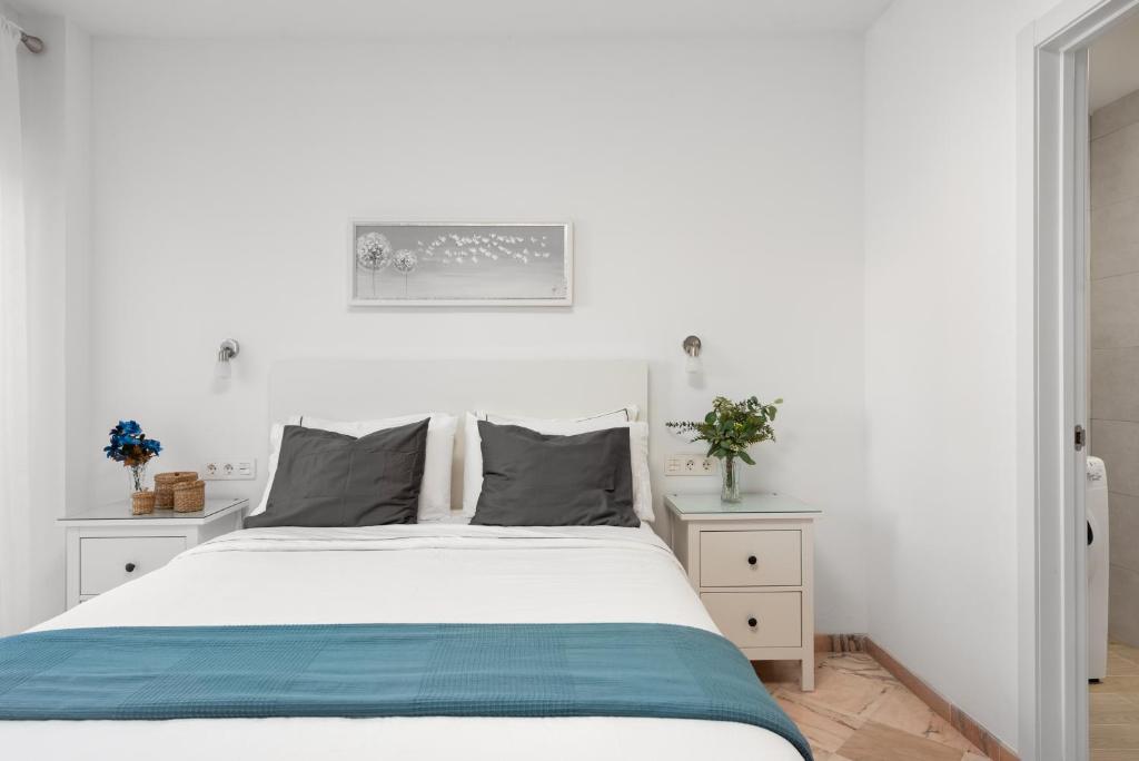 Postel nebo postele na pokoji v ubytování Romana Playa Apartamento Elviria