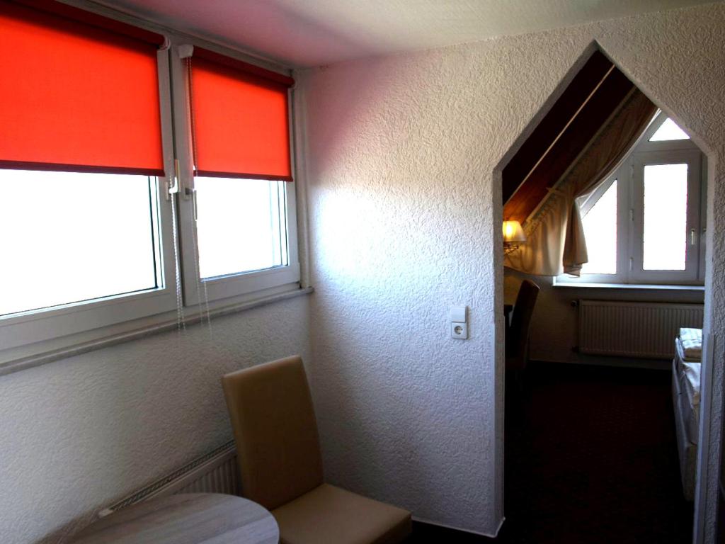 Postel nebo postele na pokoji v ubytování Airport Hotel Filder Post