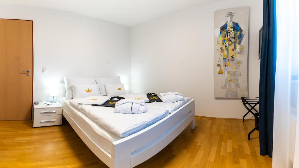Postel nebo postele na pokoji v ubytování Bella Mura Blue Apartment