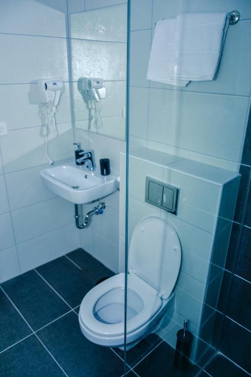 Koupelna v ubytování Hotel Story