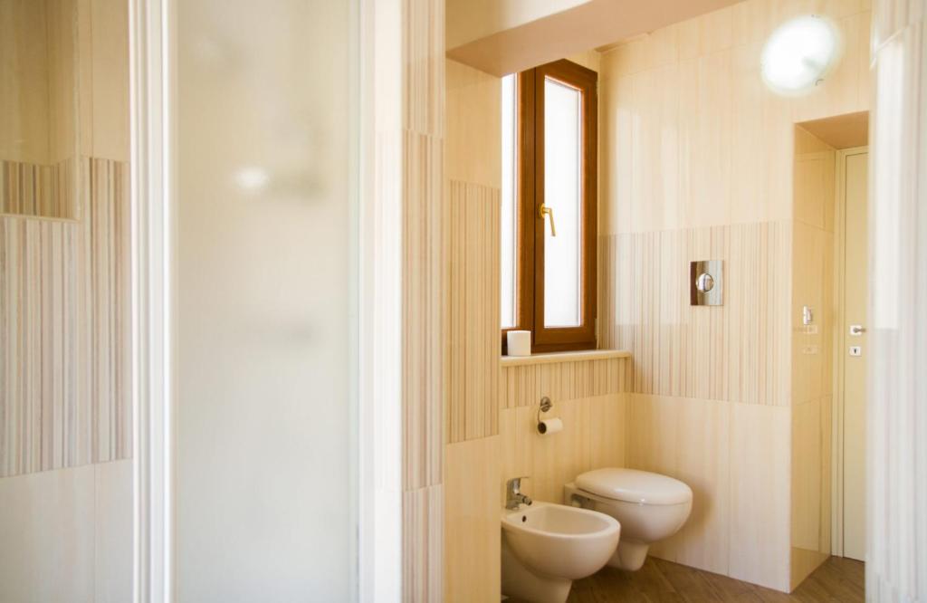 Koupelna v ubytování Rooms Gli Arcangeli - Affitti Brevi Italia