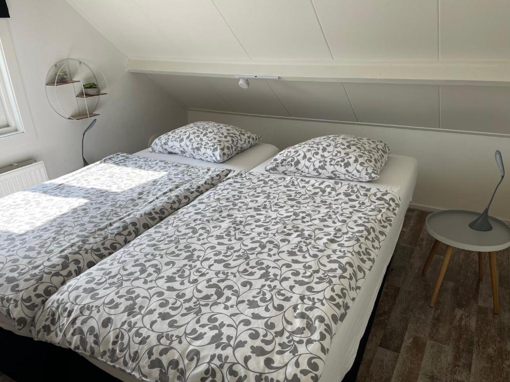 Postel nebo postele na pokoji v ubytování Me Oissie