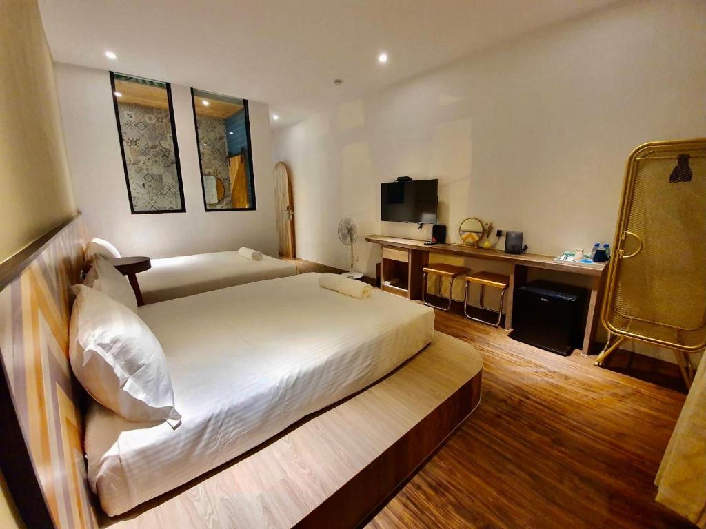 Postel nebo postele na pokoji v ubytování MiM House