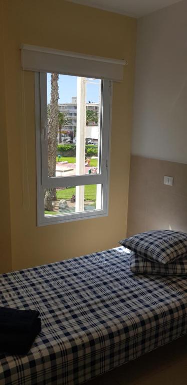 A bed or beds in a room at Stylish Apartment