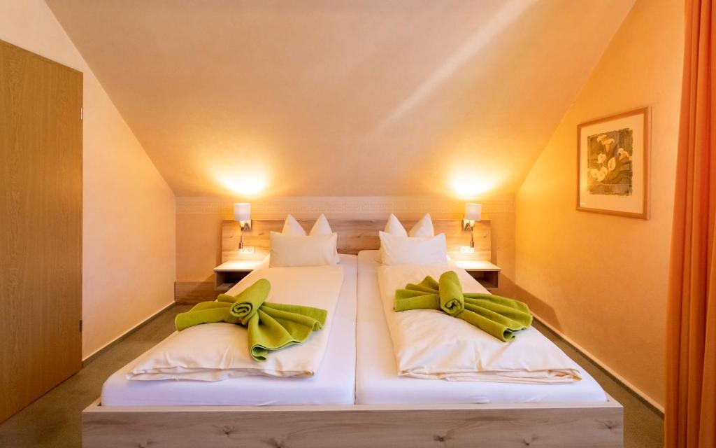 Postel nebo postele na pokoji v ubytování Hotel Zum Steinhof