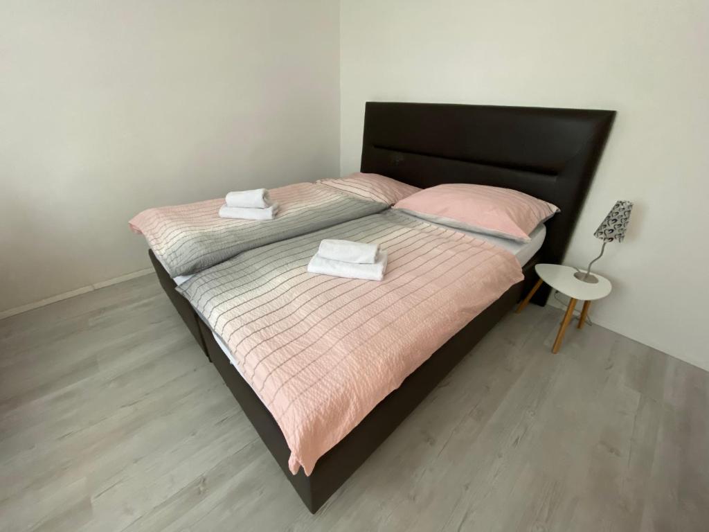 Postel nebo postele na pokoji v ubytování Penzión Oáza