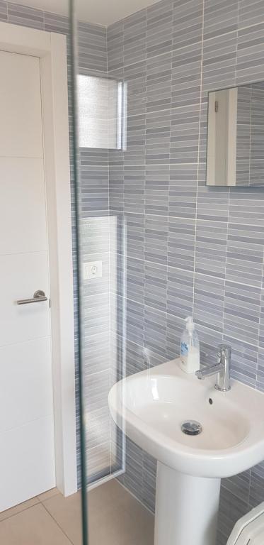 A bathroom at Stylish Apartment