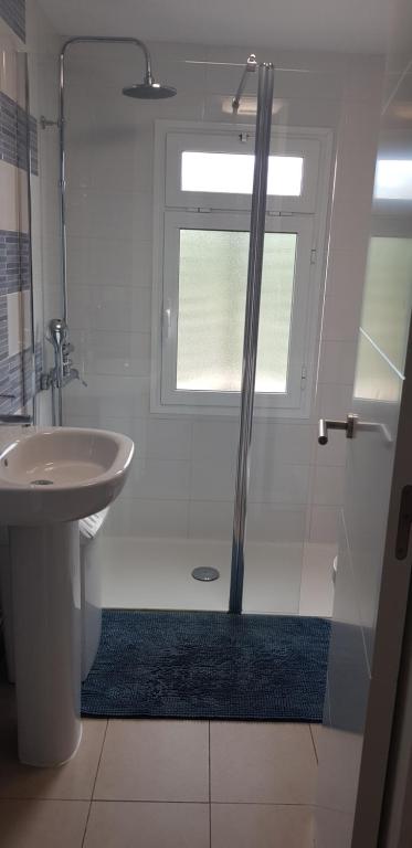 A bathroom at Stylish Apartment