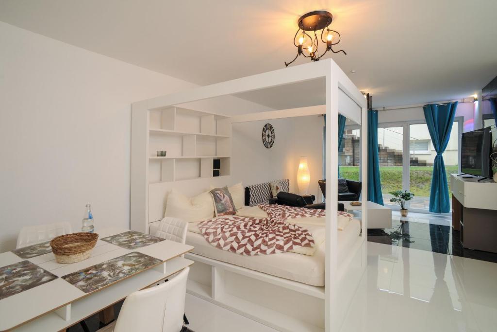 Postel nebo postele na pokoji v ubytování Designpension Idyll Nr21 Hotel Garni