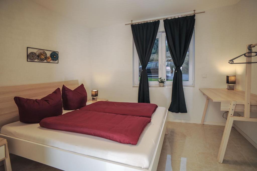 Postel nebo postele na pokoji v ubytování Designpension Idyll Nr21 Hotel Garni
