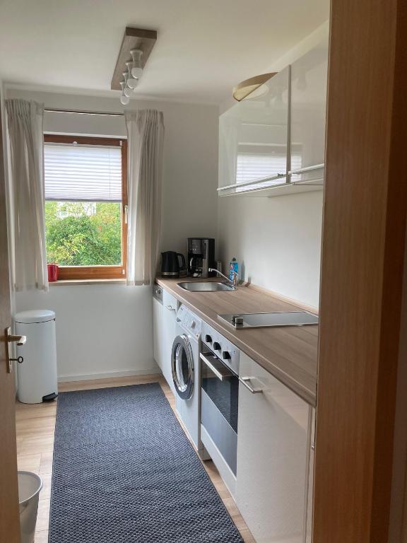 Kuchyň nebo kuchyňský kout v ubytování Ferienwohnung Panorama