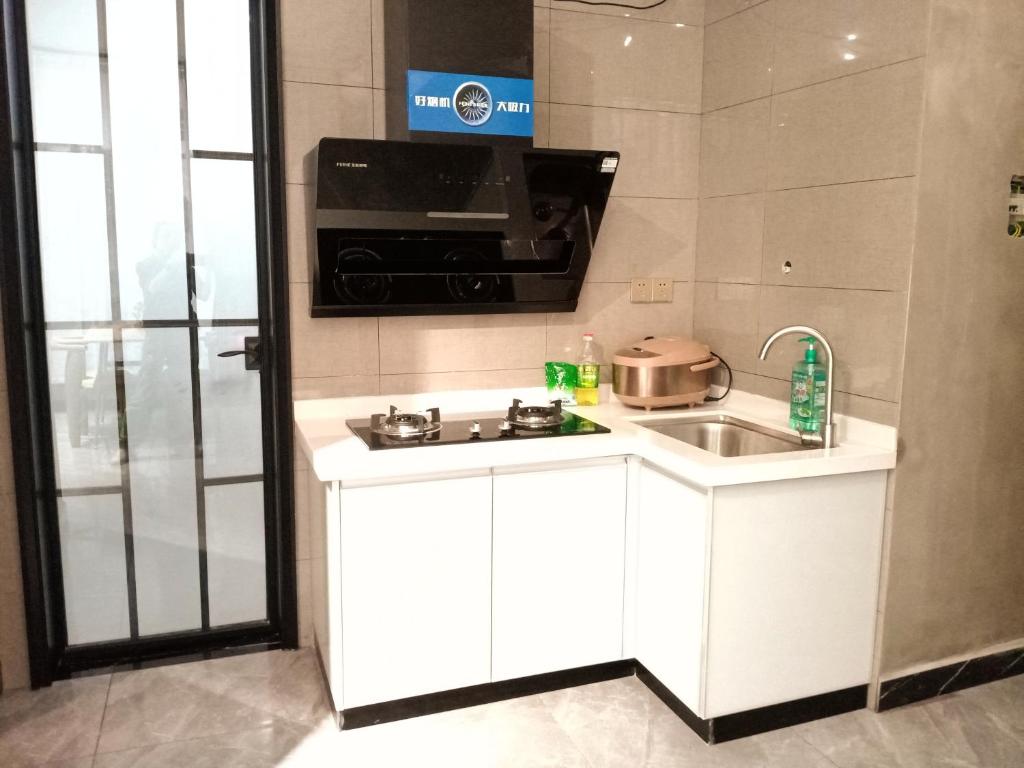 Kuchyň nebo kuchyňský kout v ubytování A&G Apartment