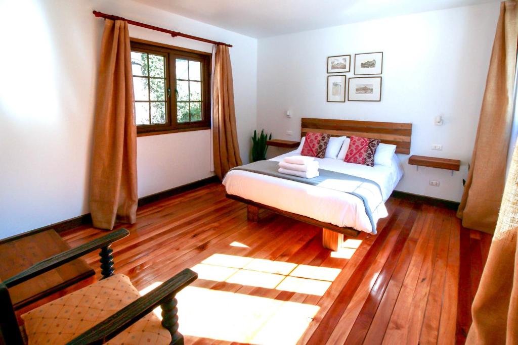 Postel nebo postele na pokoji v ubytování Casa California Guesthouse