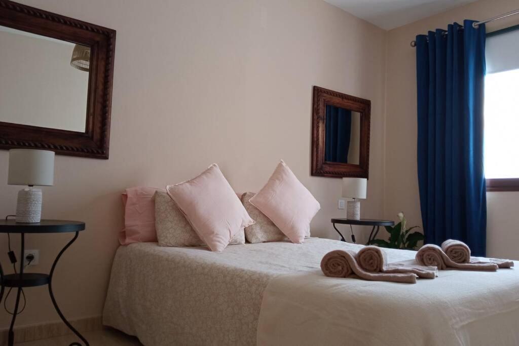 Postel nebo postele na pokoji v ubytování Casa Las Olas