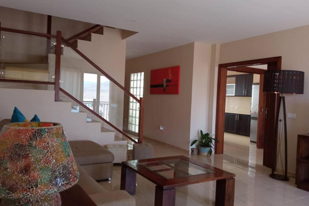 TV a/nebo společenská místnost v ubytování Casa Las Olas