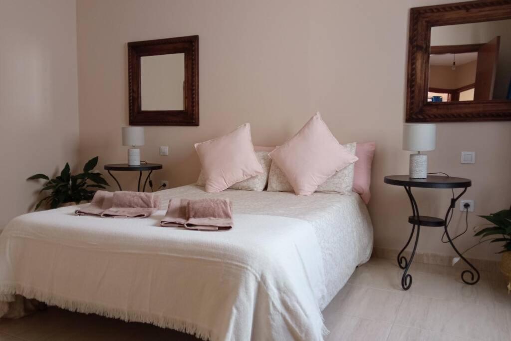 Postel nebo postele na pokoji v ubytování Casa Las Olas