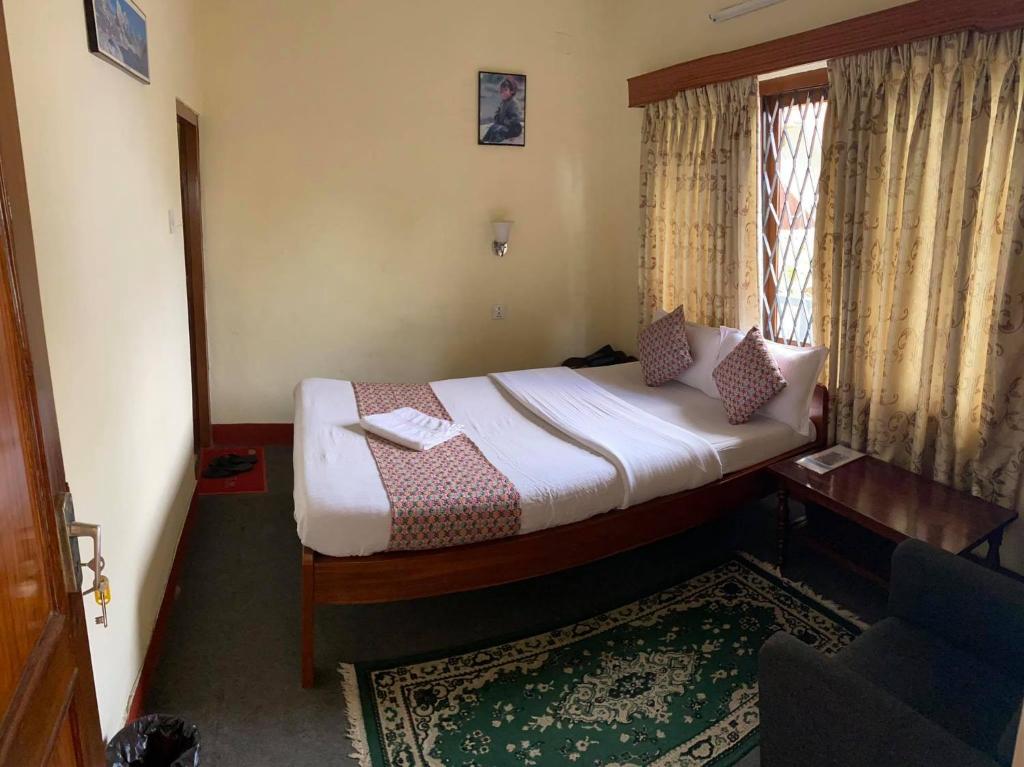 Postel nebo postele na pokoji v ubytování Hotel Blue Magnet