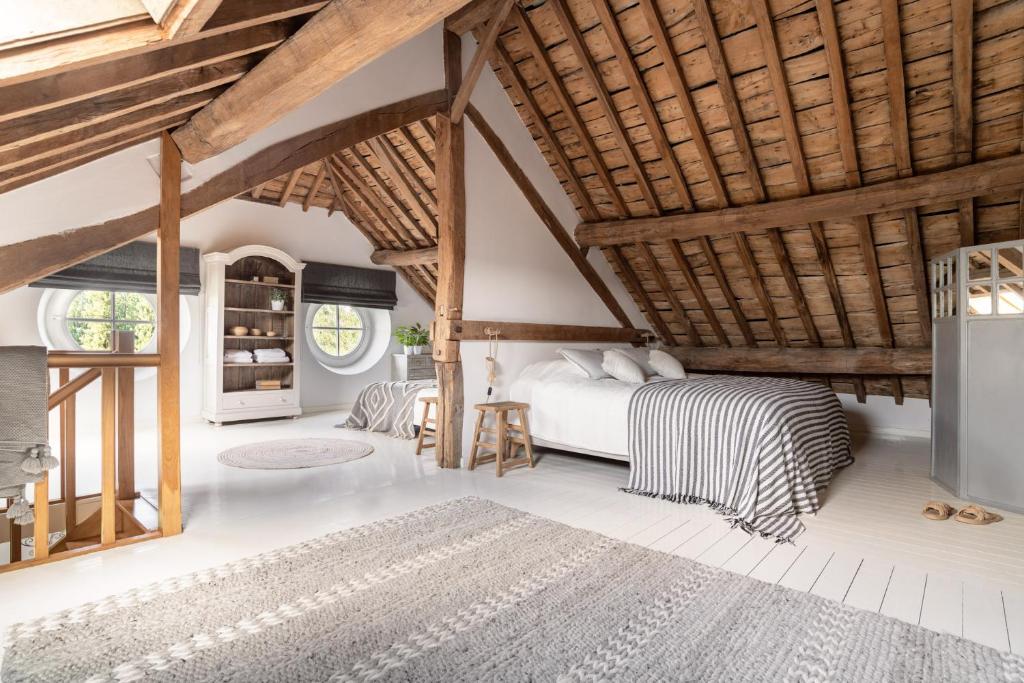 Postel nebo postele na pokoji v ubytování Maison Colette