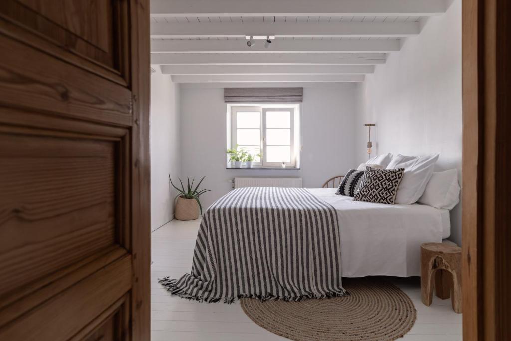 Postel nebo postele na pokoji v ubytování Maison Colette