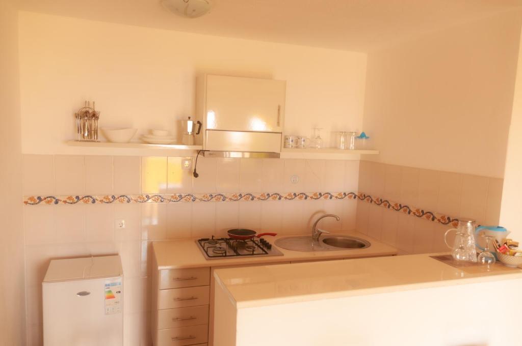 Kuchyň nebo kuchyňský kout v ubytování Misturod - Holiday Apartments