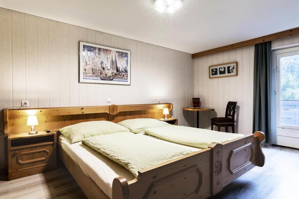 Postel nebo postele na pokoji v ubytování Haus Ruepp