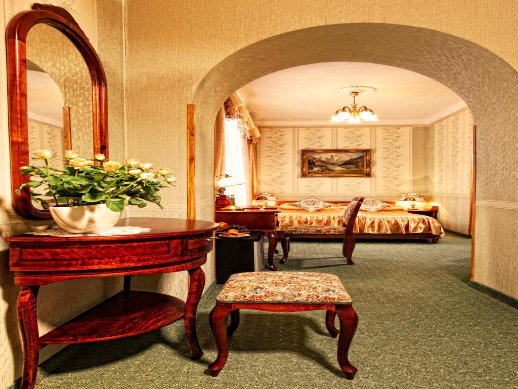 Posteľ alebo postele v izbe v ubytovaní Hotel Europejski
