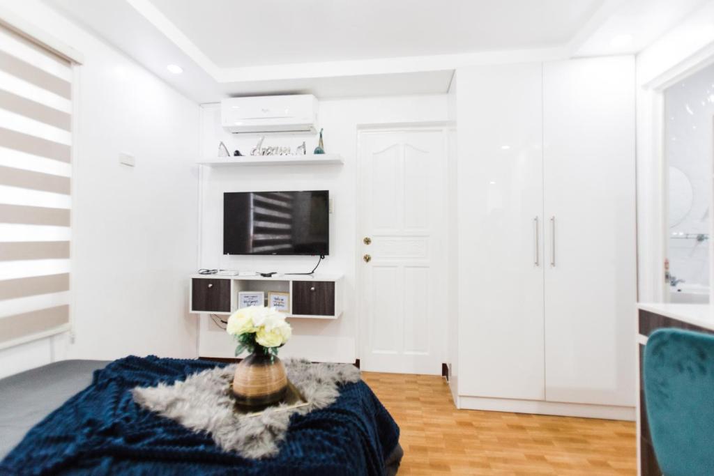 TV a/nebo společenská místnost v ubytování Bella Casa (3BR House at Azienda Genova)
