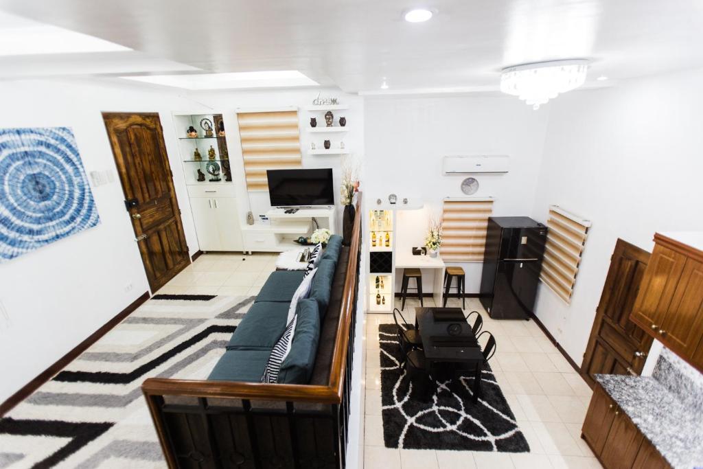Posezení v ubytování Bella Casa (3BR House at Azienda Genova)