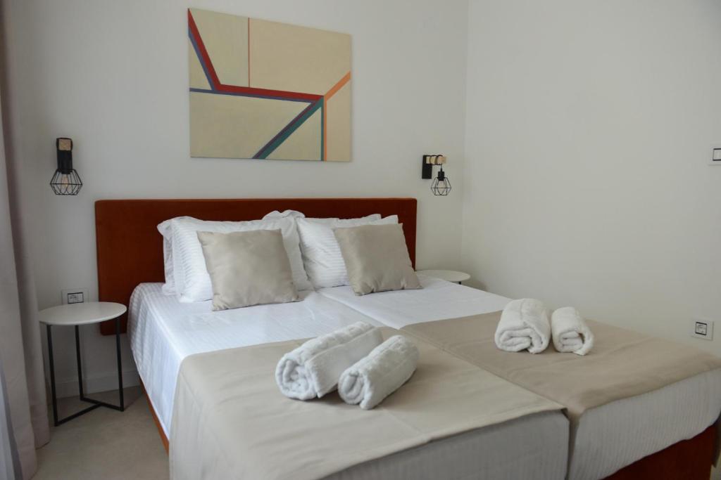 Postel nebo postele na pokoji v ubytování 9 apartments