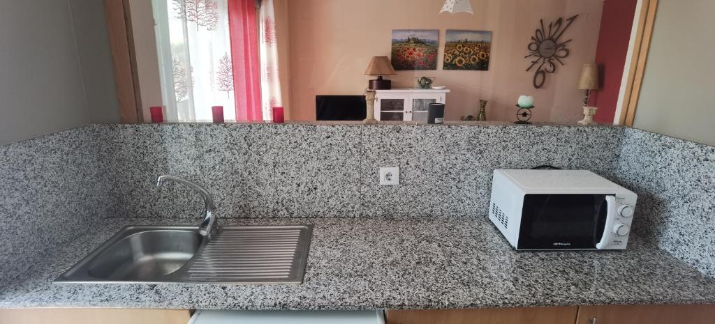 Kuchyň nebo kuchyňský kout v ubytování sanluis