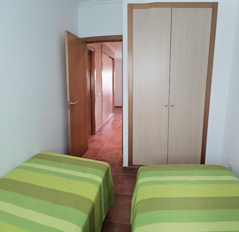 Postel nebo postele na pokoji v ubytování sanluis