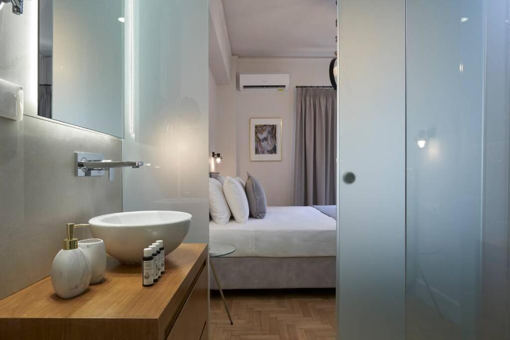 Postel nebo postele na pokoji v ubytování Ilisia Park Contemporary 2BD Condo