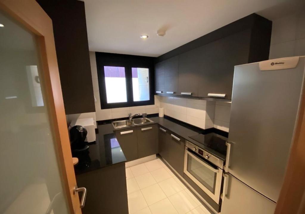 Kuchyň nebo kuchyňský kout v ubytování Apartament l'Areny 22- 6p - Canillo - Zona Grandvalira