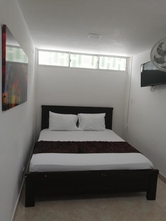 Postel nebo postele na pokoji v ubytování Hotel Sol del Estadio