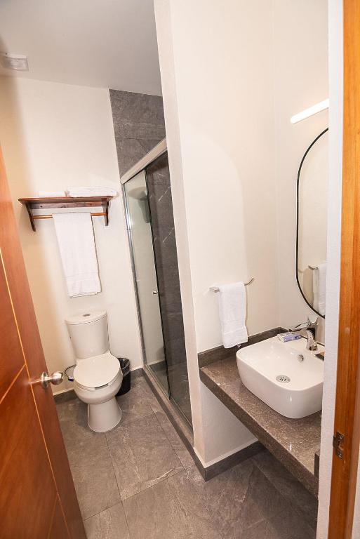 Koupelna v ubytování Hotel Danini