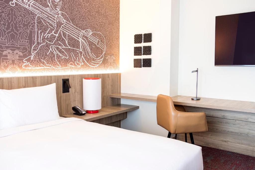 Postel nebo postele na pokoji v ubytování Hyatt Centric Soalteemode Kathmandu