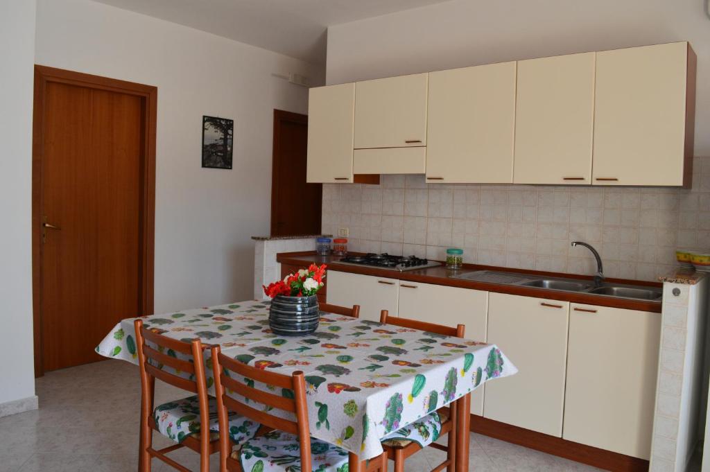 Kuchyň nebo kuchyňský kout v ubytování Le Zagare Case Vacanza