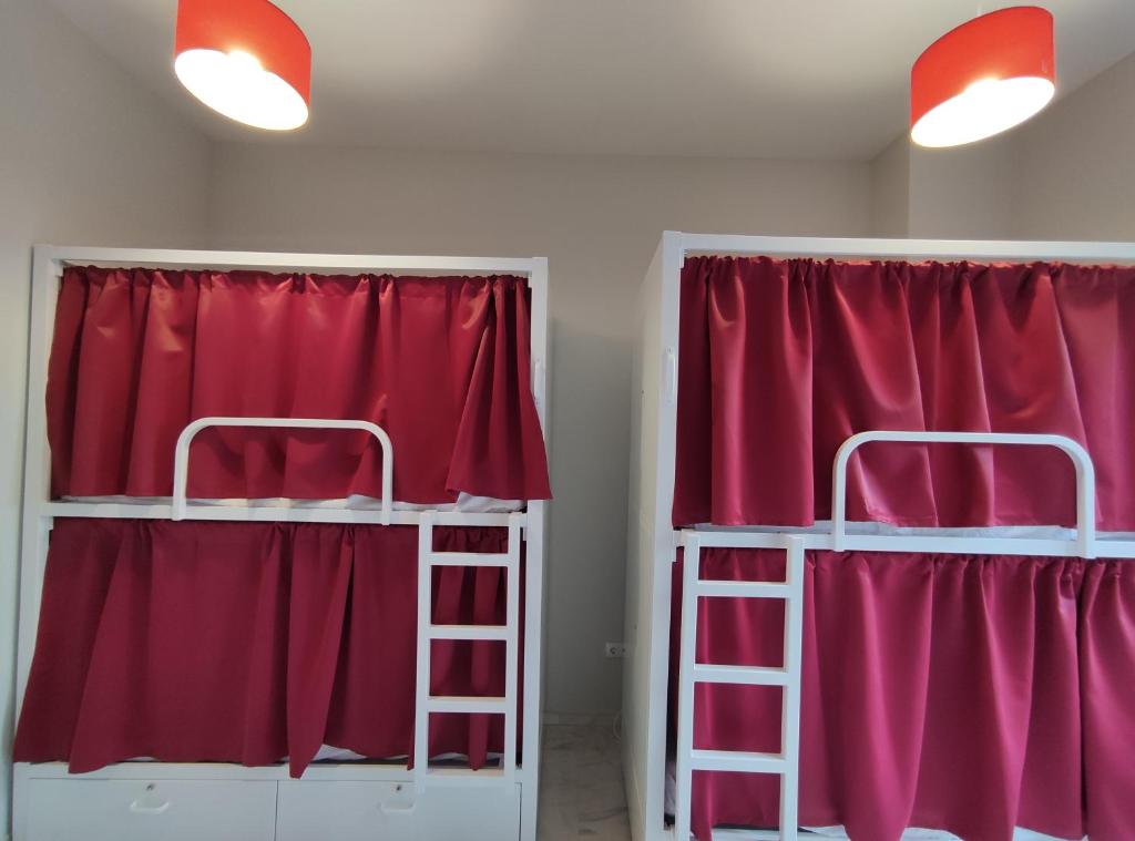 Posteľ alebo postele v izbe v ubytovaní New Samay Hostel