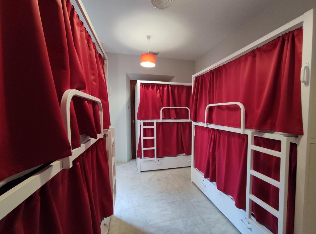 Posteľ alebo postele v izbe v ubytovaní New Samay Hostel