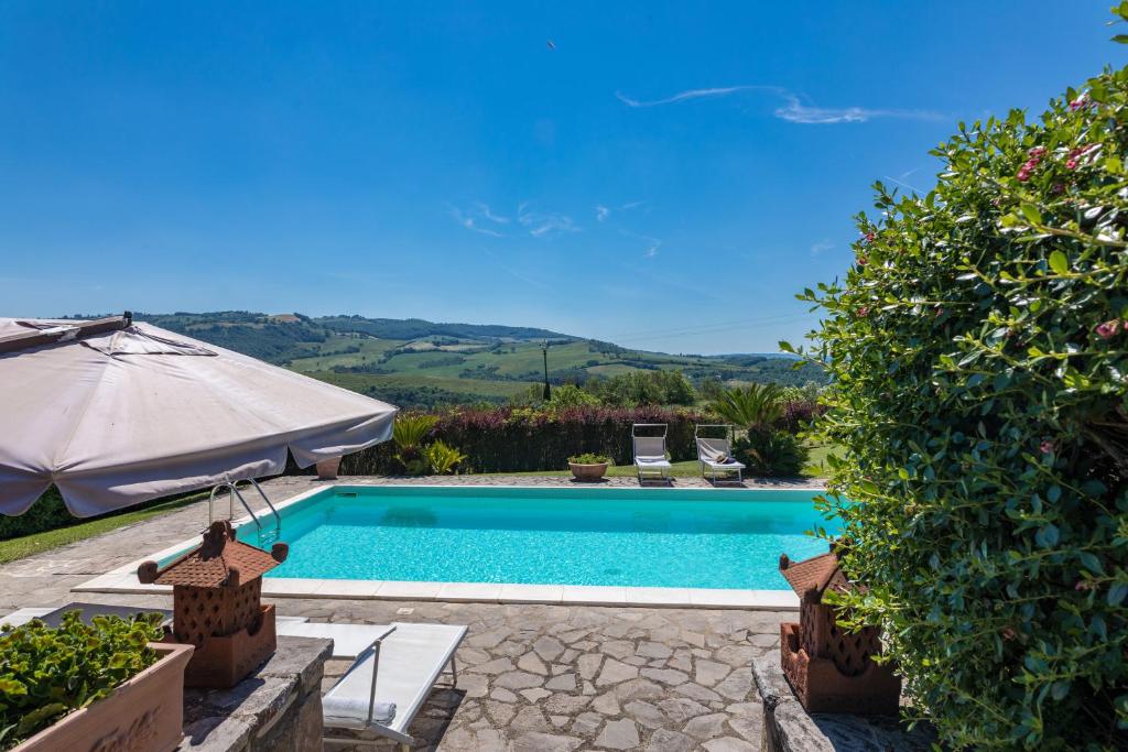 The swimming pool at or close to Casale del Viaggiatore 10, Emma Villas