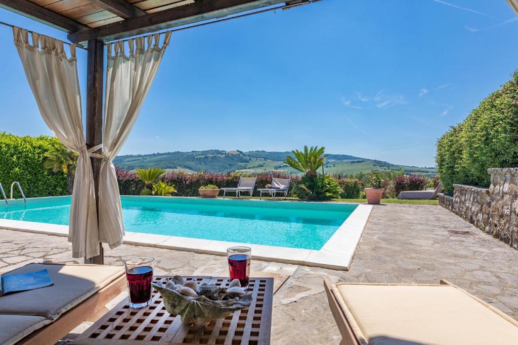 The swimming pool at or close to Casale del Viaggiatore 10, Emma Villas
