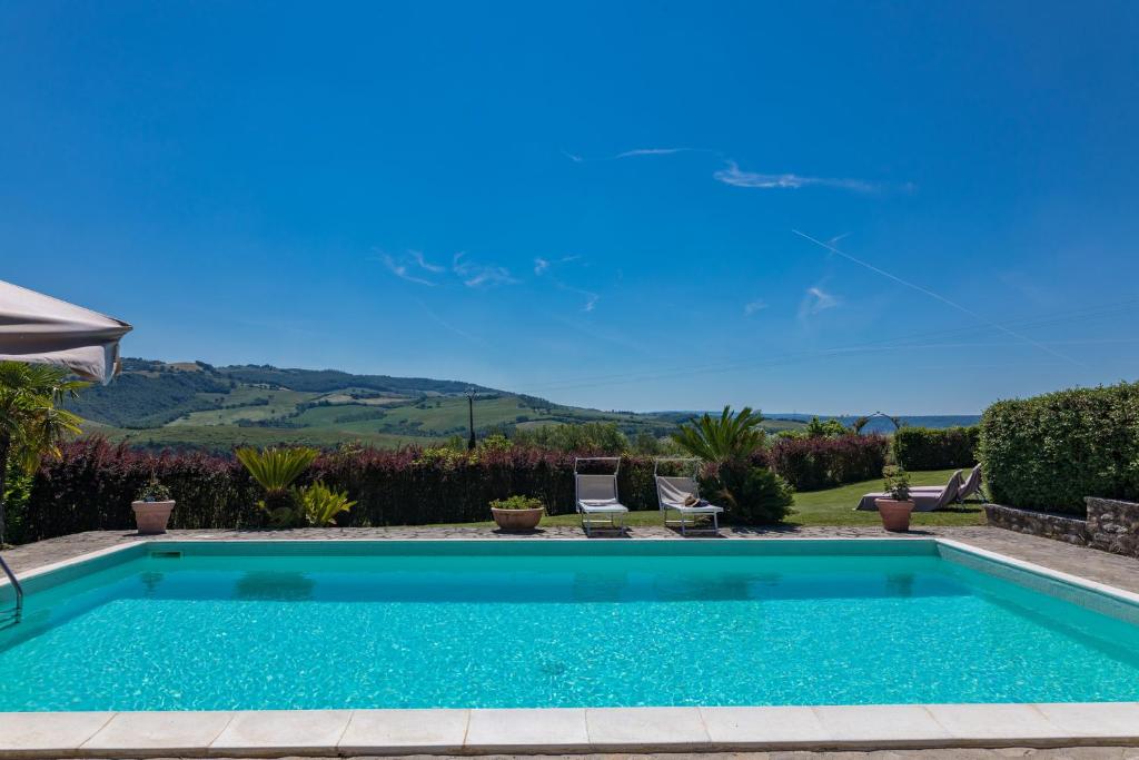 The swimming pool at or close to Casale del Viaggiatore 10, Emma Villas