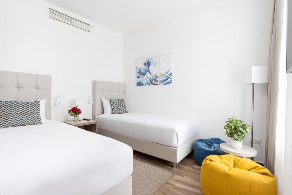Postel nebo postele na pokoji v ubytování Azul Beach Resort Montenegro by Karisma - All Inclusive