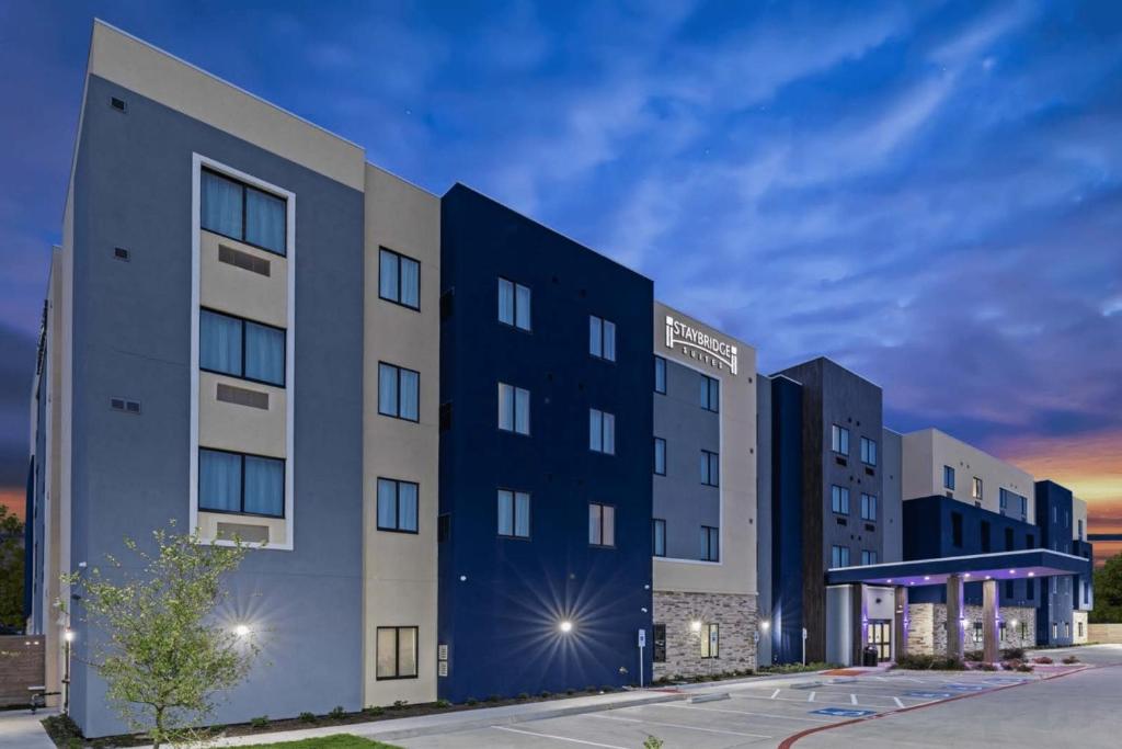 a rendering of the front of a hotel at Staybridge Suites Waco South - Woodway, an IHG Hotel in Woodway