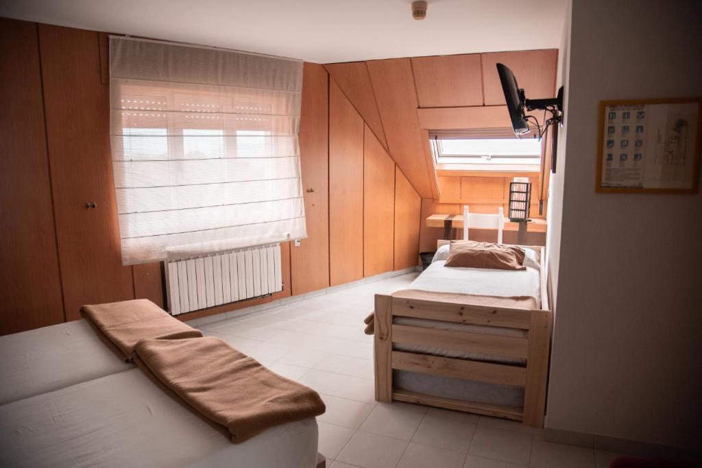 Posteľ alebo postele v izbe v ubytovaní Hotel Los Olmos