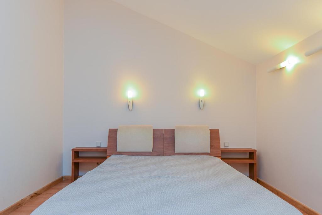 Postel nebo postele na pokoji v ubytování Tako Baras