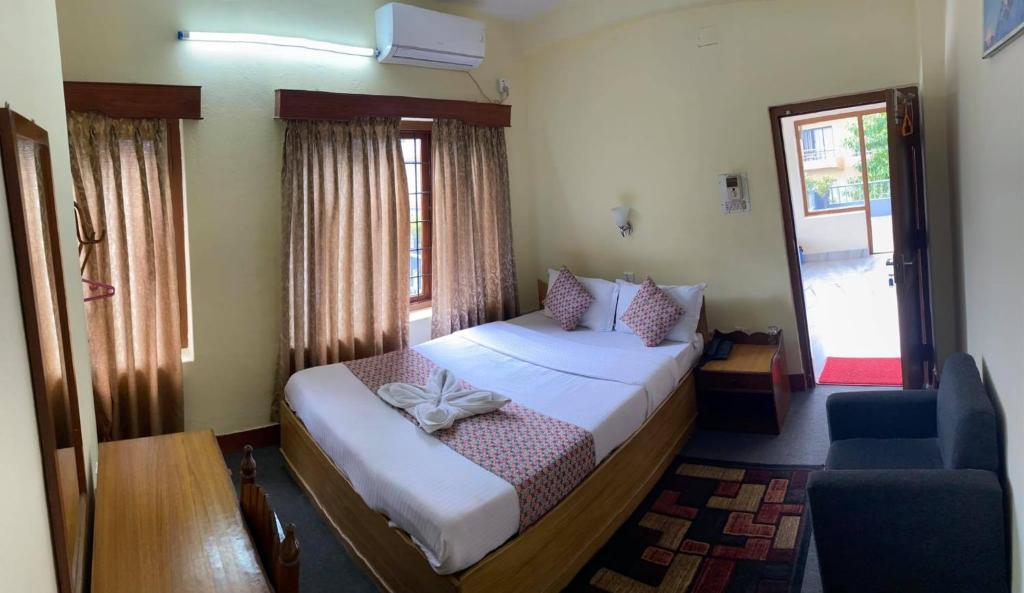Postel nebo postele na pokoji v ubytování Hotel Blue Magnet