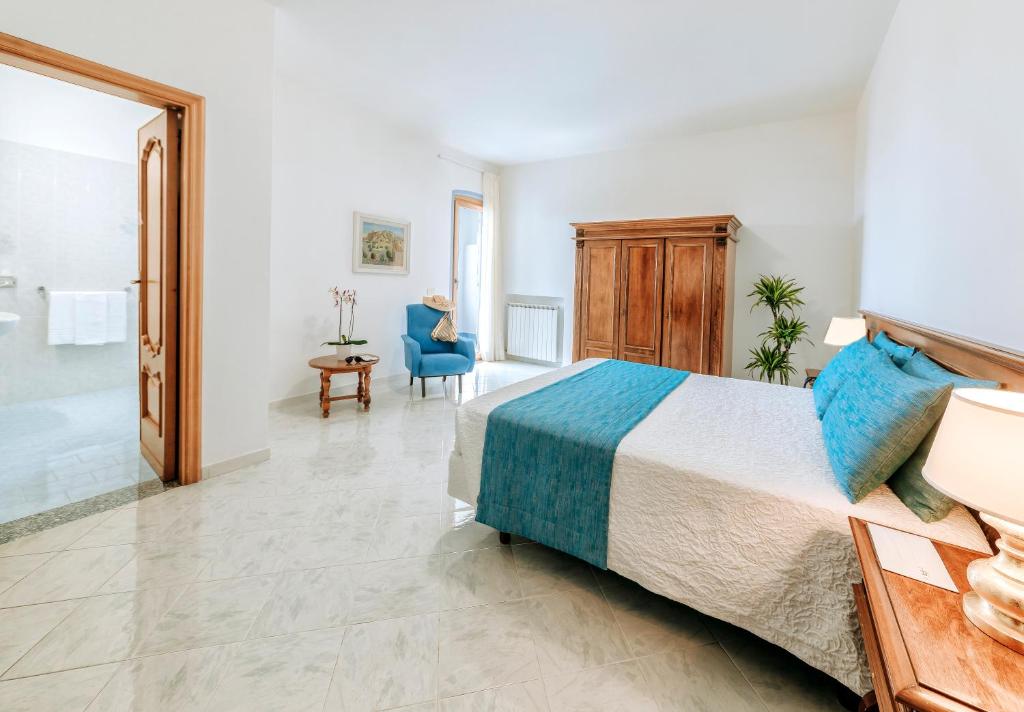 Postel nebo postele na pokoji v ubytování Hotel Zaro